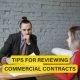 Tips for reviewing commercial contracts, focusing on understanding key clauses, compliance, and identifying potential risks.